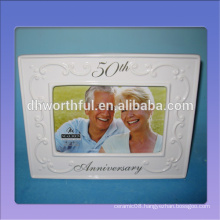 White ceramic wedding anniversary photo frame for 50th wedding anniversary
